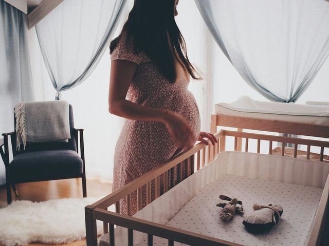 A pregnant mother at home